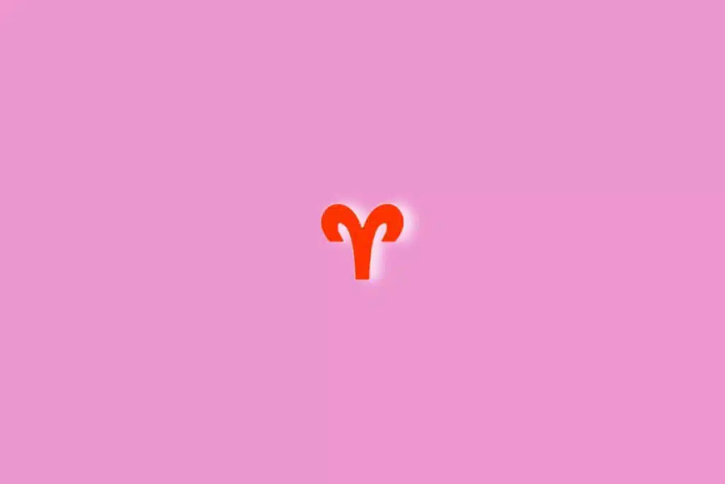 Fundo rosa com o símbolo do signo de Áries em vermelho no centro da imagem. Luz branca ao redor dele
