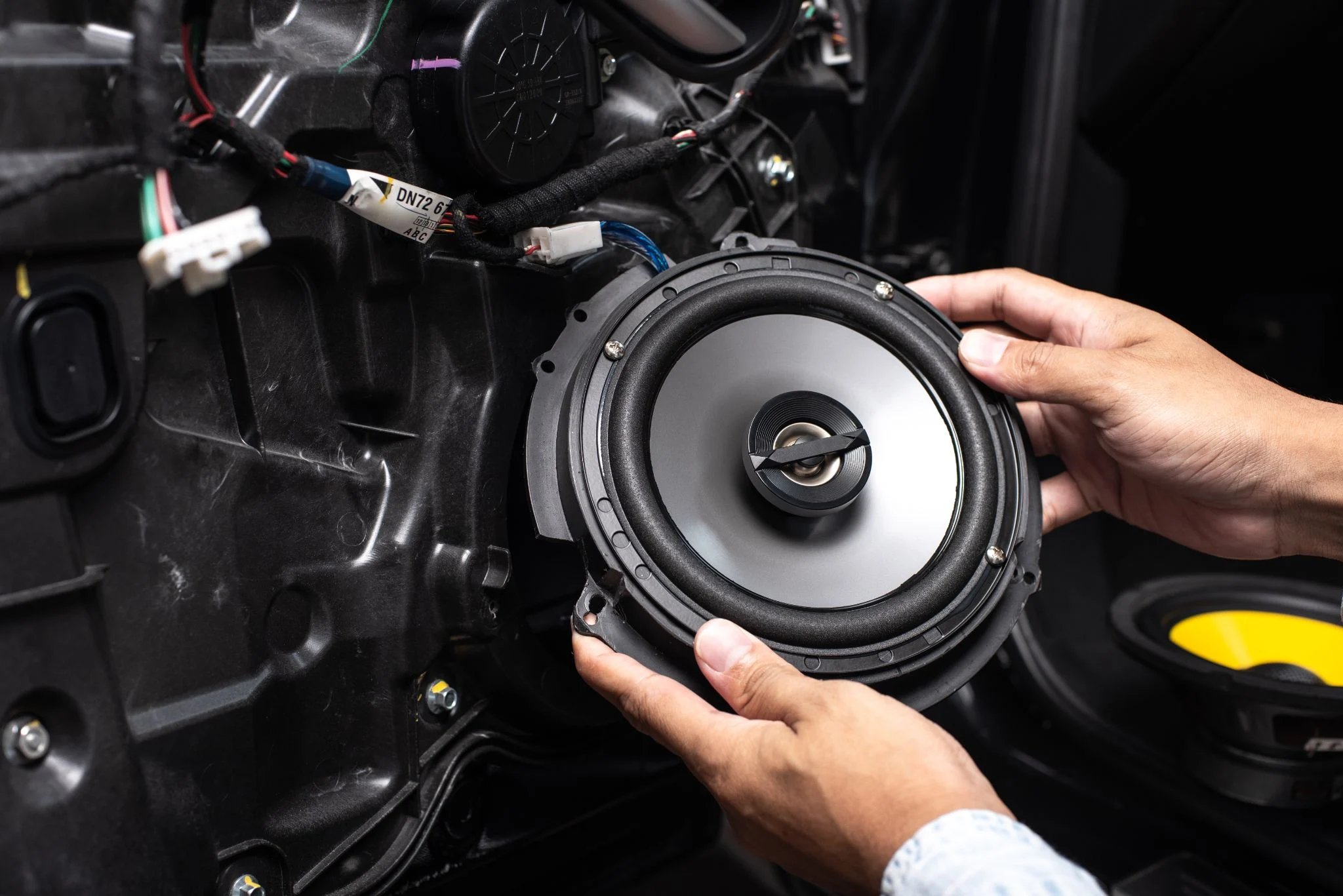 Technician,Installing,The,Car,Speaker,To,The,Car,Door ,Car